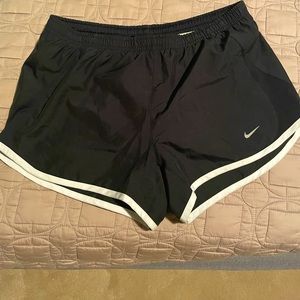 Black Nike running shorts